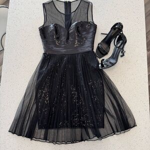 Elegant Black Sequin Dress with Sheer Details